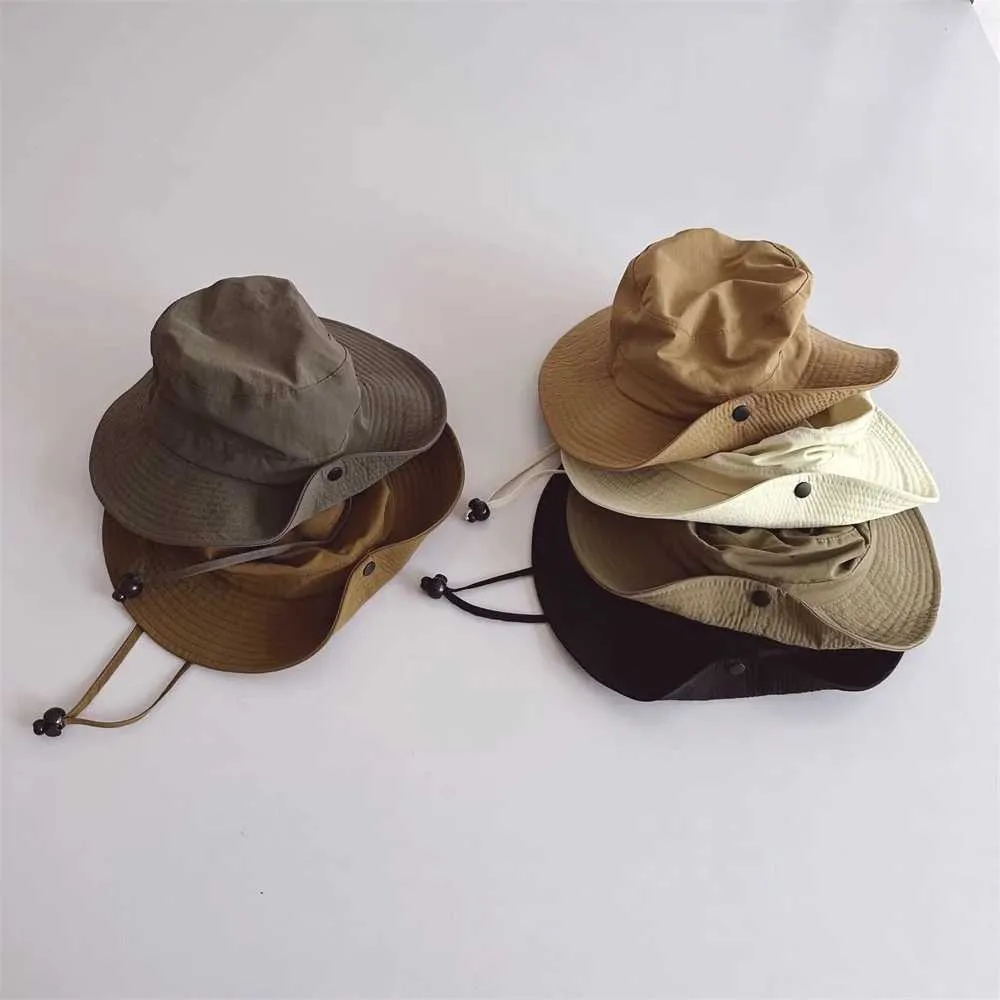 Chapeaux à large bord Chapeaux de seau Nouveau chapeau de seau pour enfants été solide chapeau de soleil chapeau de pêche pour enfants chapeau de soleil visière garçons et filles en plein air mode chapeau de plage 2-6 ans J240305