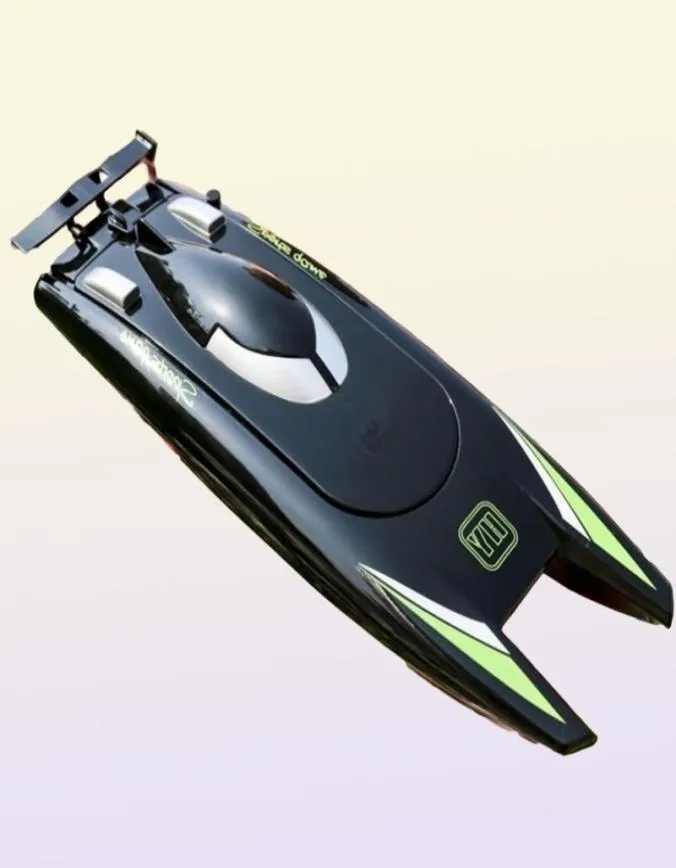 Electric RC Boats 2 4Ghz RC Racing Boat High Speed Yacht 30 KM H Remote Control Speedboat Rowing Ship Model USB Charging Water Gam9091356