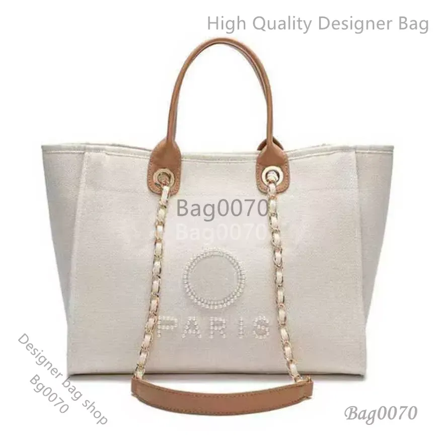Tasarımcı çantası klasik lüks kadın el tuval plaj çantası çanta çanta büyük sırt çantaları kapasite küçük zincir paketleri büyük crossbody p979 fabrika mağazası ABD satış