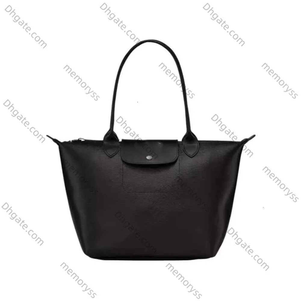 2024 Dumpling Tote Bag Niche Series High-End Universal Womens Bag Stor medium Långt handtag Enkel axel underarmsäck