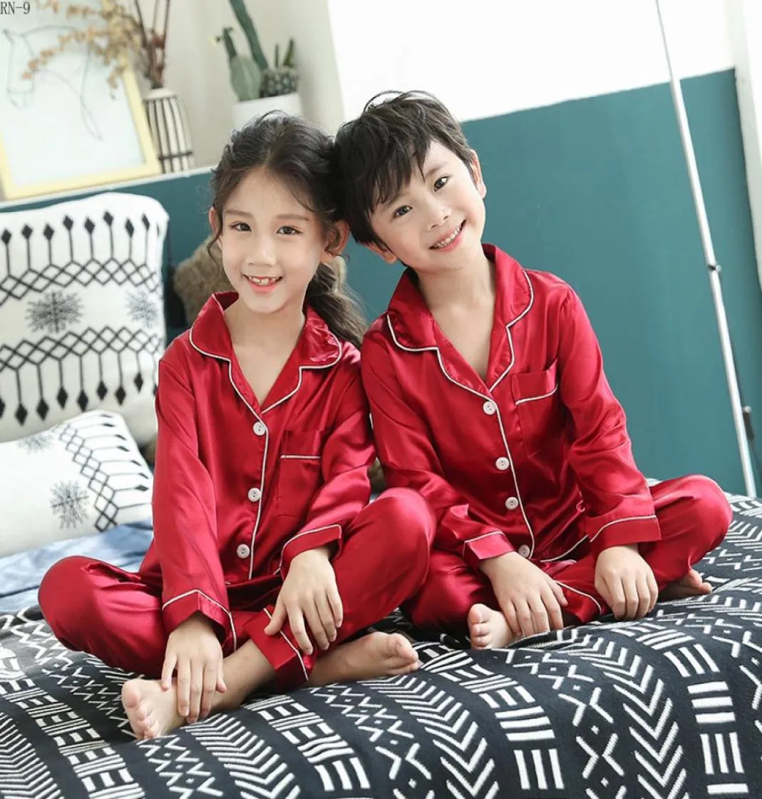 RN9 Spring Children Pyjamas Suit 2019 Summer Kids Soild Silk Pyjamas Set Boys Homewear Stain Girls Long Sleeve Pyjamas Set T200102685158