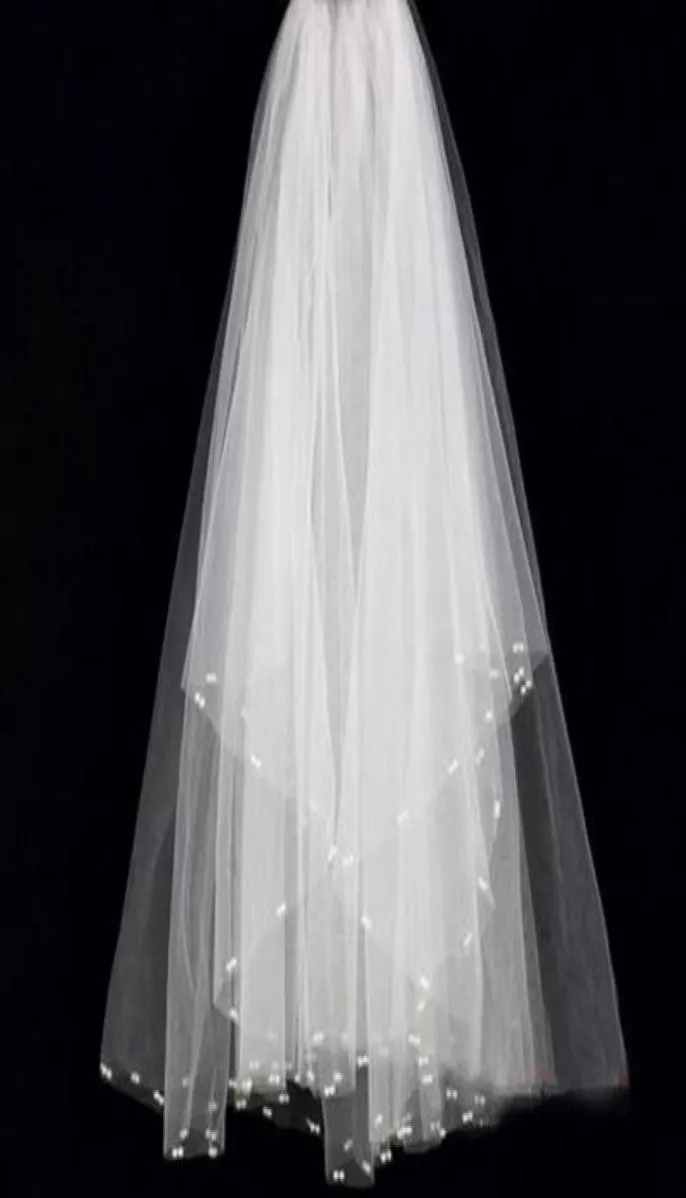 Superbe nouveau voile de mariée court en tulle doux voiles de mariée avec des perles exquises pas cher accessoire de mariée ivoire de haute qualité4923986