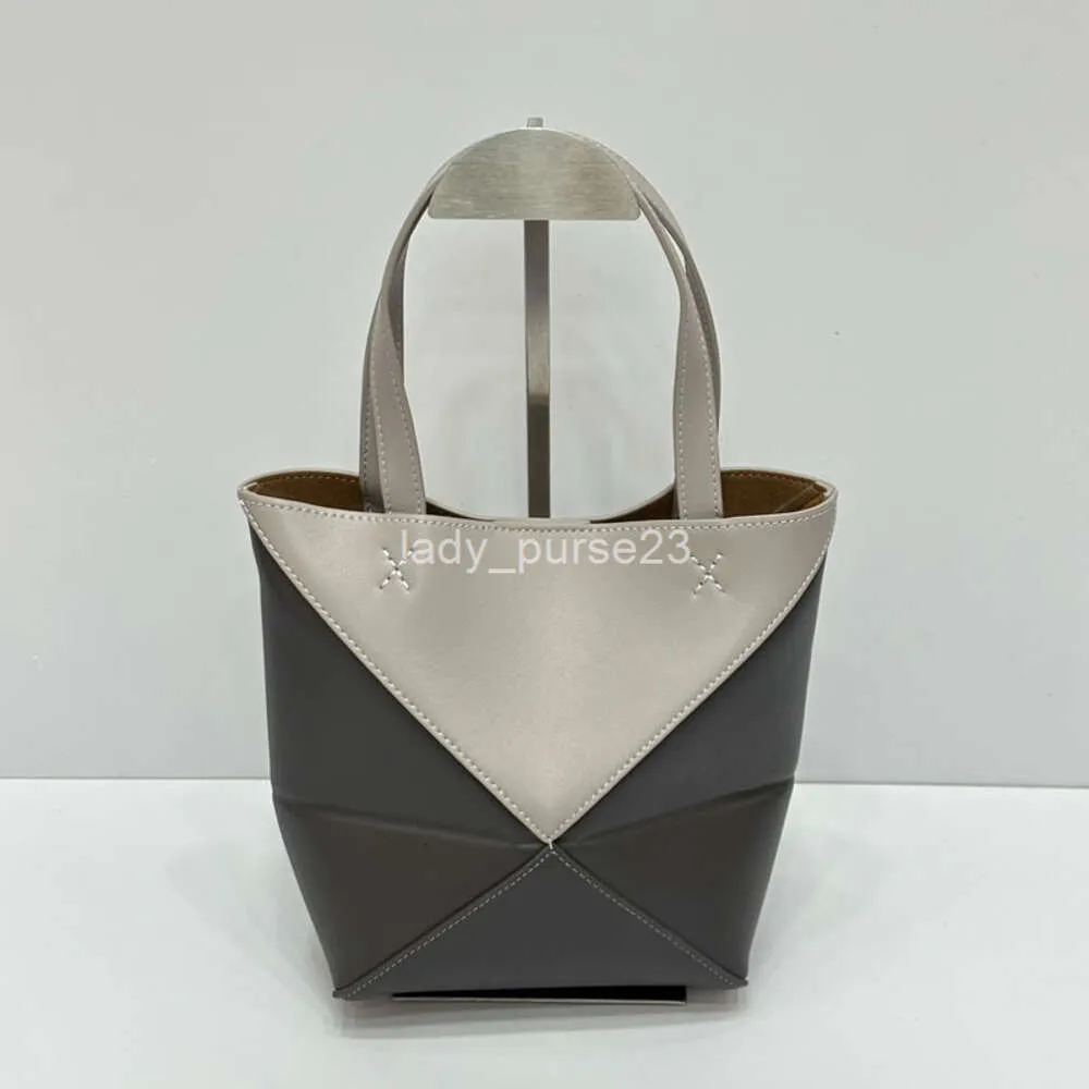 Polyvalent L0ewe Sacs Fille Espagne Sac Designer 2024 Femmes Totes Nouveau Puzzle / Géométrie pliante Mode unique épaule sous les bras fourre-tout avec Sense Outlier Bucket Ylbj