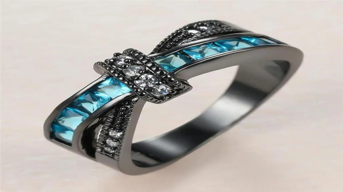 Bröllopsringar Creative Crossed Ring Aqua Blue Crystal Zircon for Women Jewelry Vintage Fashion Black Gold Stone Engagement3950964