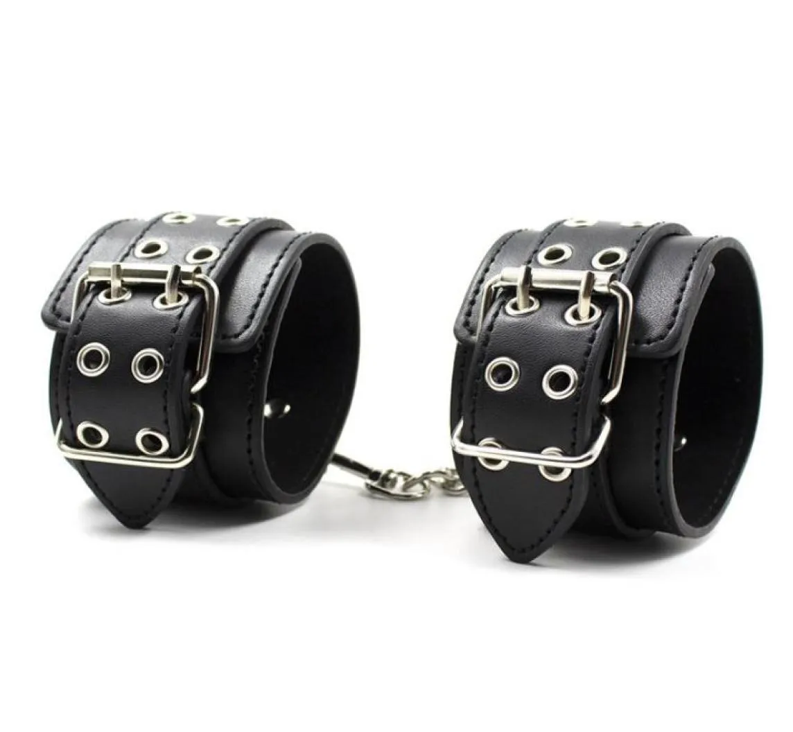 W1023 SEX Vuxen Game Fetish Handcuffs Black Leather Wrist Restraints Sexig dräkt cosplay slavhand manschetter för sex leksaker6042543