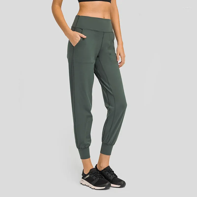 Pantalon actif Logo personnalisé Entraînement naturellement doux Gym Jagger Femmes Stretch 4 voies Yoga anti-transpiration Courir Joggeurs athlétiques avec poche