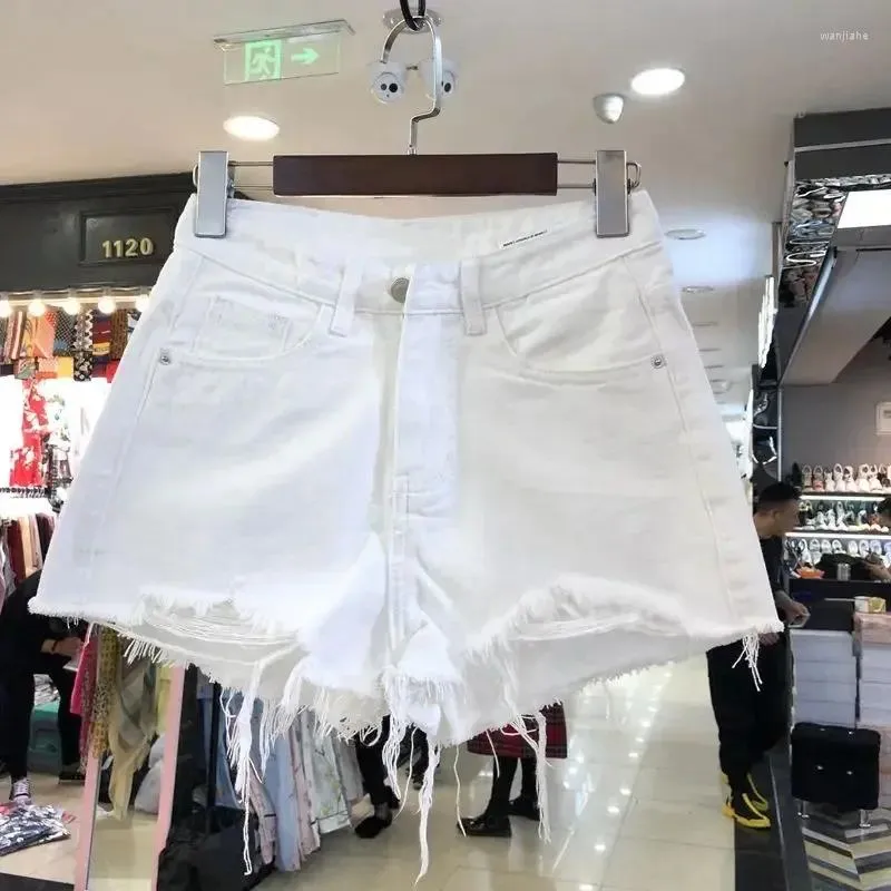 Kobiety szorty kobiety wiosna i lato podarte dżinsową wysoką talię Nieregularne białe krótkie spodnie Ropa Mujer