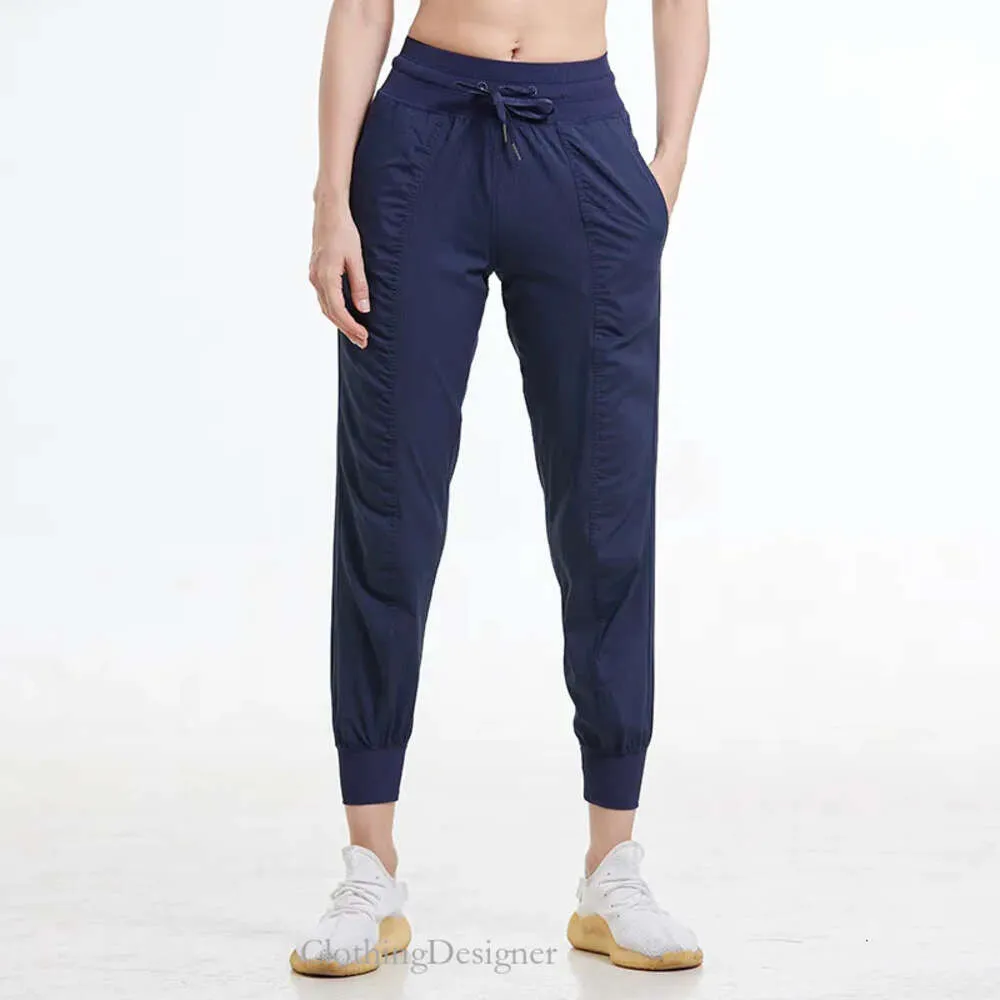 Sport Relaxed Lady Sheg Yoga Pants Jogger Accendi con leggings con pista da tasca usura sportiva per la palestra da donna