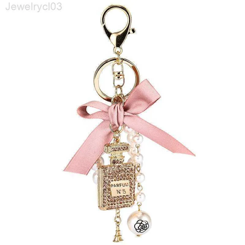 Fashion Imitation Pearl Parfym Bottle Keychain Car Key Ring Women Bag Charm Tillbehör Söt Bow Chain Creative Keyrings G1019Suer29Hi