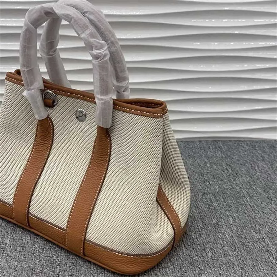 70% Factory Outlet Off top layer cowhide with linen canvas garden wide strap real leather tote portable women's bag on sale