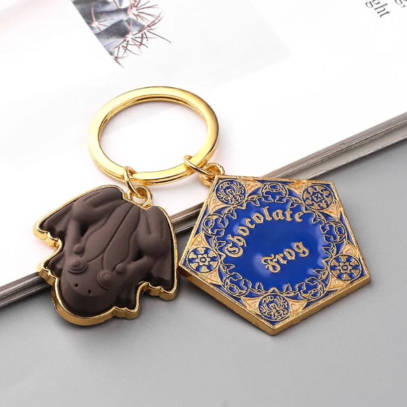 Whole 10 pcs lot Movie Potter Frogs Chocolate Keychain Platform Pendant Key Chains for Women Men Cosplay Jeweley Gift T200804292q