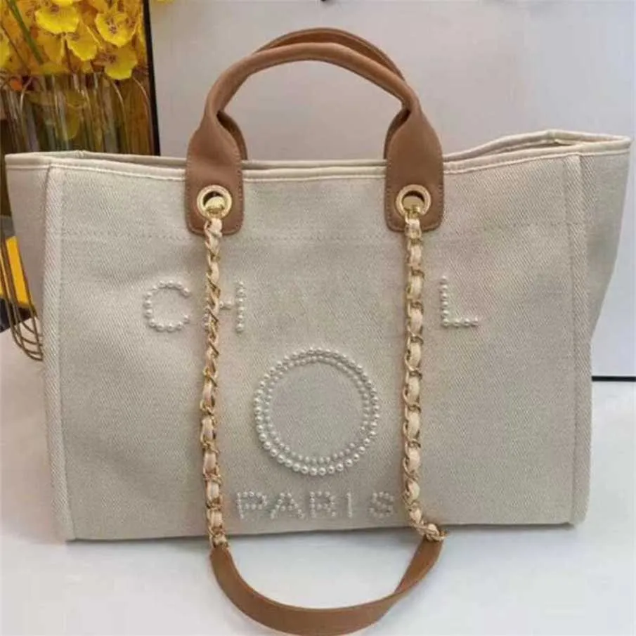 70% Factory Outlet Off Borsa da spiaggia classica in tela a mano da donna Borse a tracolla Zaini grandi Capacità Confezioni a catena piccola Borsa a tracolla grande 6UXK in vendita