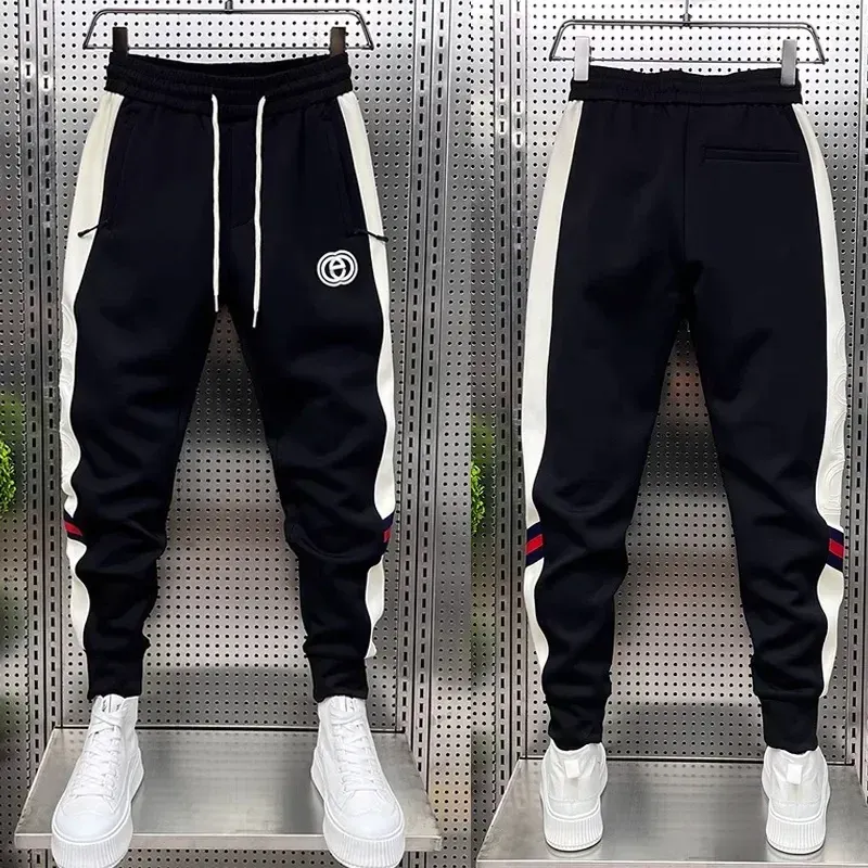Spodnie czarne białe dresowe spodnie dresowe na zewnątrz spodnie joggera jesień mody bawełniane spodnie luksusowe marki męskie ubranie