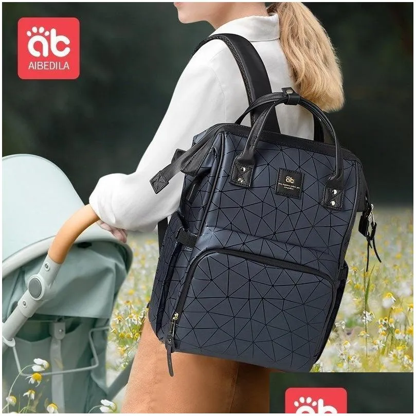 Sacos de fraldas Aibedila Mommy Bag Impermeável Grande Capacidade Moda e Suprimentos de Alta Qualidade para Mulheres Bebês Mochilas Drop Delive Dh78i