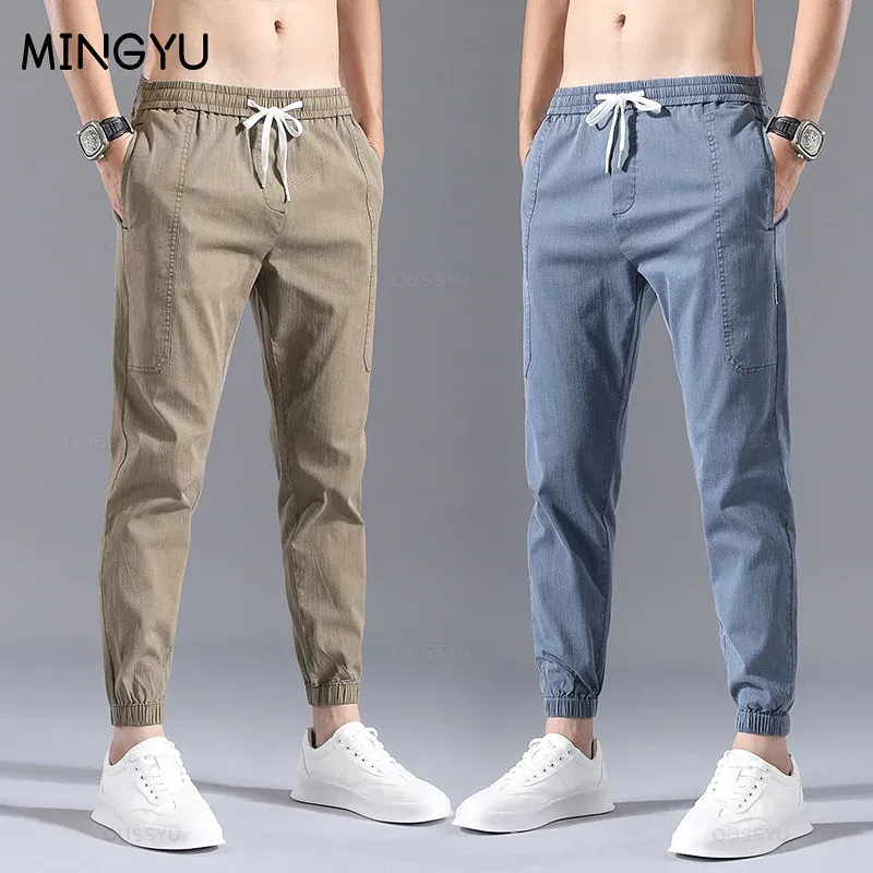 Pantaloni primavera estate streetwear hip hop pantaloni pantaloni da carico maschile elastico harun ankleleglength pantalone joggers kaki imita jeans maschio