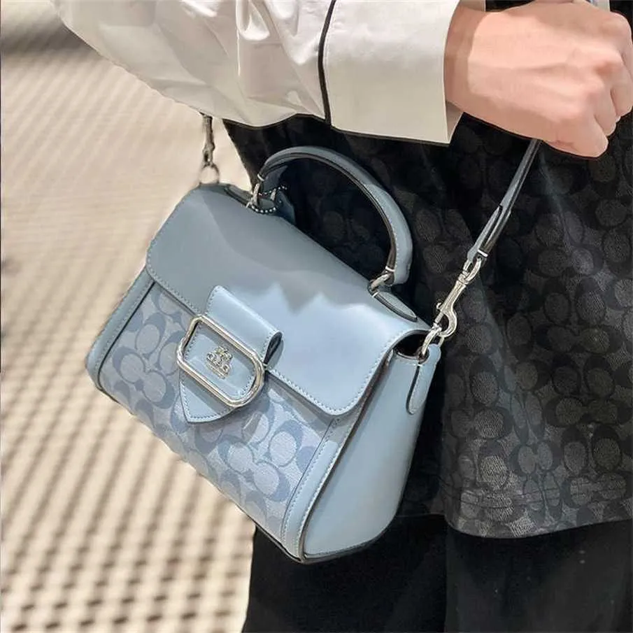 70% fabriksuttag från Olay Women's Carriage Flip Small Square Litchi -mönster Skriv ut en crossbody -väska till försäljning