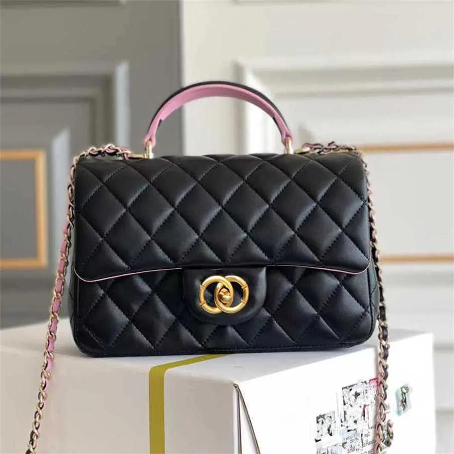 70% fabryczne zbycie Xiangfeng oryginalne skórzane mini -uchwyt mini klapa mała owcza skóra dwupięta torba na nadgarstek torebka crossbody w sprzedaży