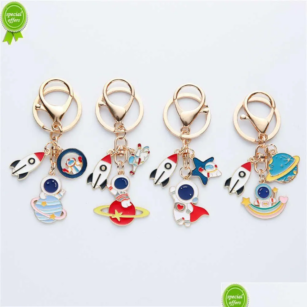 Clé de voiture Nouveau créatif astronaute porte-clés en métal émaillé fusée étoile porte-clés planète pendentif pour les étudiants sac ornement clé accessoire partie Dhtwp