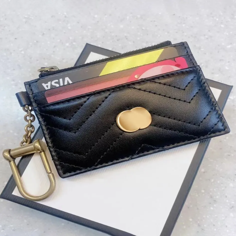 Luxurys designers Luxury Coin Purses Card Holder Key Pouch Woody Fashion Passport Holders Credit Mens Womens äkta läder Wrist267G