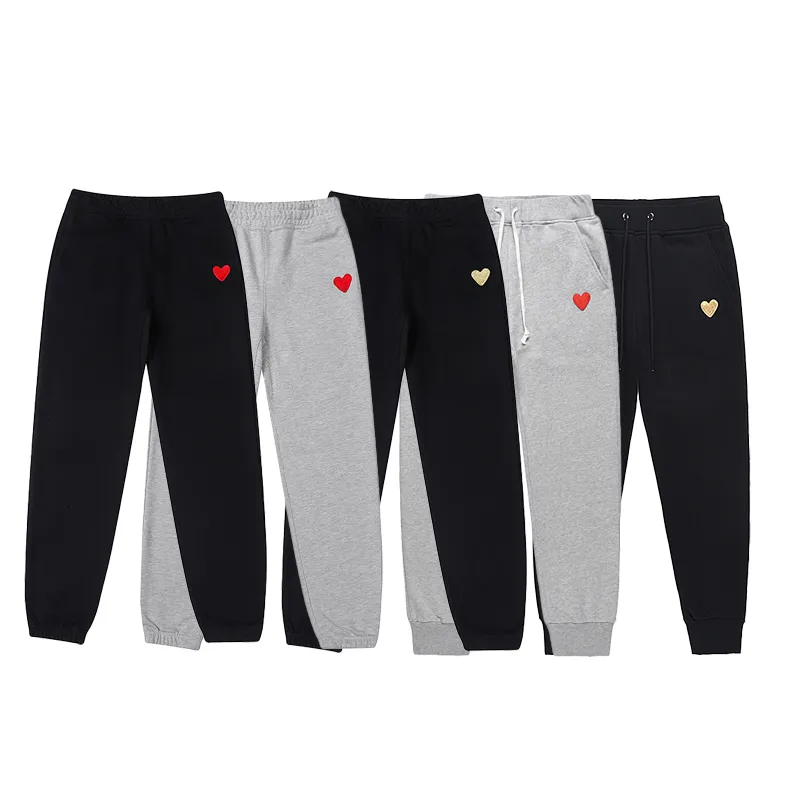 Pantaloni da uomo firmati da donna pantaloni da jogging pantaloni firmati moda stampa cuore pantaloni della tuta larghi comodi pantaloni da tuta fitness casual