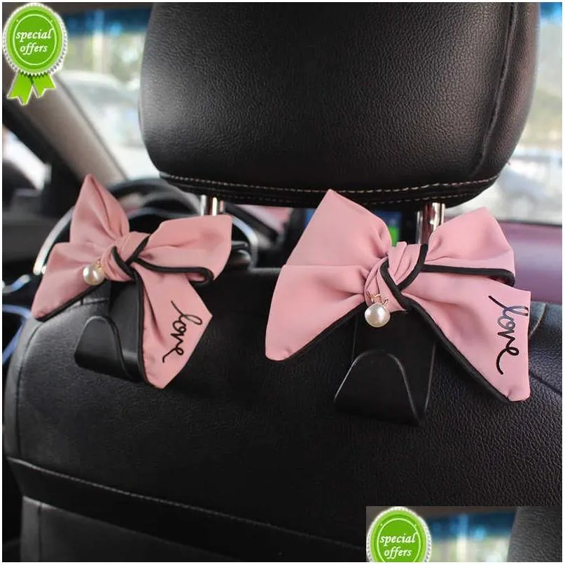 Autres accessoires d'intérieur Nouveau mignon diamant Bowknot siège de voiture crochets de rangement arrière véhicule appui-tête organisateur cintre pour sac d'épicerie dans DHA8G