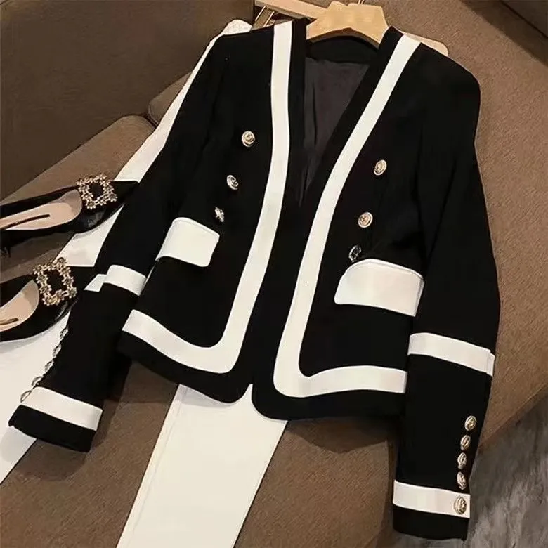 Europees zwart-wit contrasterend pak voor dames in de vroege herfst, nieuw high-end gevoel, lichte luxe, veelzijdige jas met metalen gesp