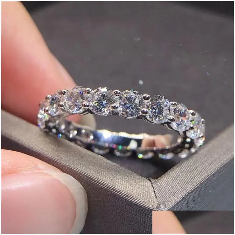 Anelli di nozze Eternity M Anello con diamante Moissanite 100% reale 925 Sterling Sier Fascia per feste per donne Uomini Gioielli di fidanzamento Drop Deliver Dh3Ya