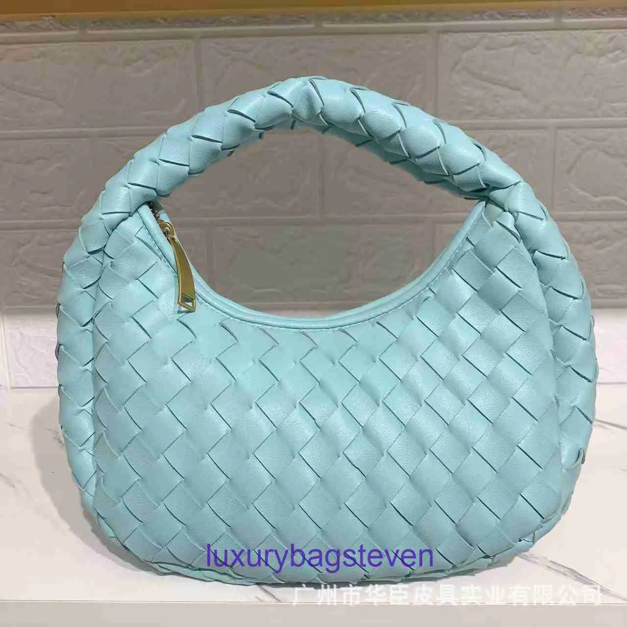 Vente en gros de sacs fourre-tout Jodie de Bottgs's Vents's Jodie, boutique en ligne, nouveau petit sac rond tissé à la main pour femmes, design japonais et coréen, avec un vrai logo, vente en gros