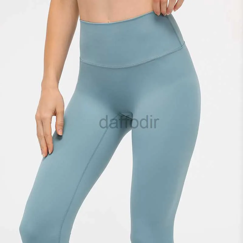 Pantalones activos Medias de talle alto Sin línea en T Fitness Yoga Pantalones de chándal con sentido desnudo Leggings elásticos para mujer Pantalones deportivos de color sólido con bolsillo en la cintura 240308