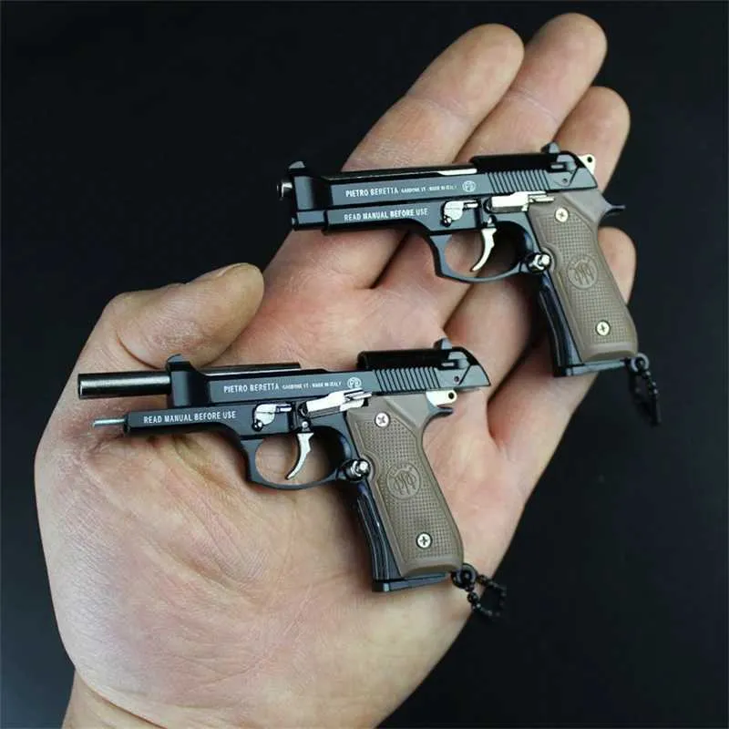 Pistola giocattoli Pistola giocattoli 1 3 modello in metallo di alta qualità Beretta 92F portachiavi pistola giocattolo ciondolo in miniatura collezione di armi in lega per regalo 2400308