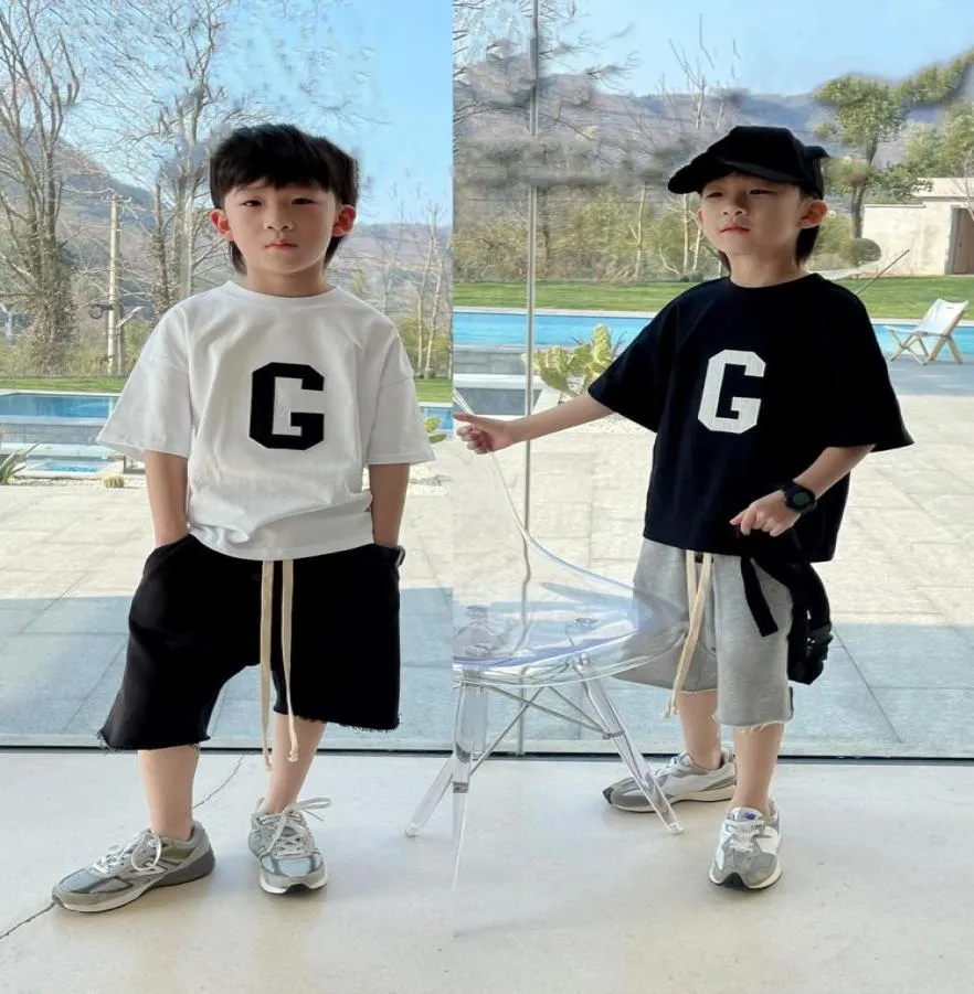 Enfants Survêtement Garçons Filles Ensembles Été Bébé Lettres T-shirt En Coton Avec short 2pcssuits Mode Enfant En Bas Âge Tenues Décontractées1941780