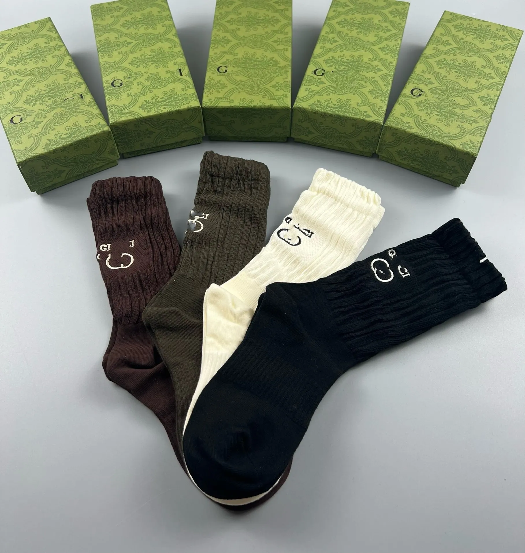 2024 calcetines simples de algodón de alta calidad con letras europeas y americanas, calcetines de tendencia para hombres y mujeres, calcetines Rhude para parejas en tubo