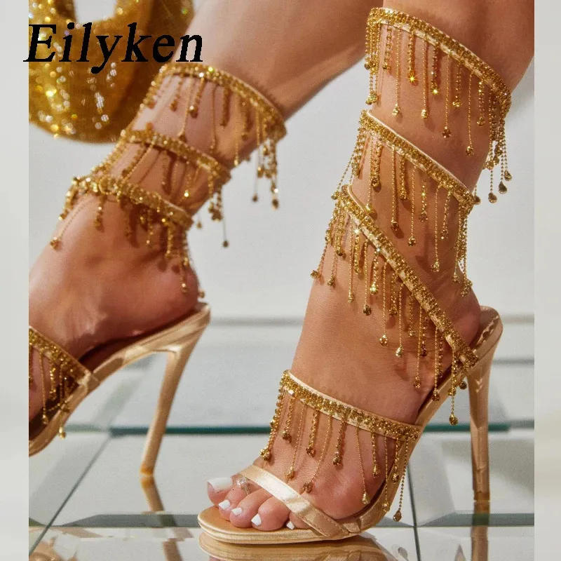 Eilyken verão moda strass sandálias de cristal dourado das mulheres corda grânulo night club stiletto calcanhar envoltório cinta peep toe sapatos 240228