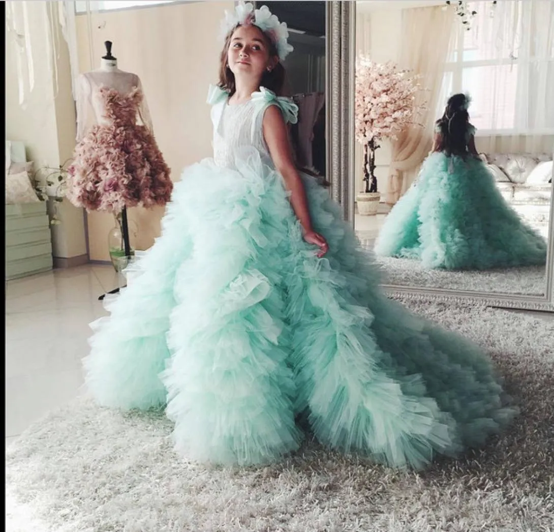 Custom Made Flower Girl Pageant Vestidos para meninas Glitz Court Train Tulle crianças vestidos de baile com arco cor de hortelã bola infantil Gow9377577