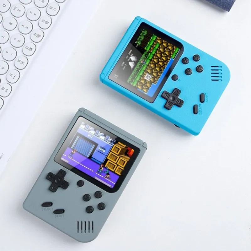 I giocatori di videogiochi portatili Macaron portatili di alta qualità possono memorizzare 500 tipi di giochi Console di gioco retrò Console con schermo LCD colorato da 3,0 pollici con imballaggio al dettaglio