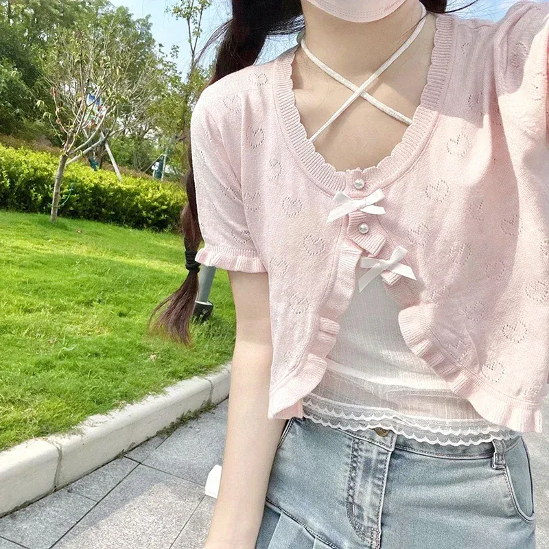 Cardigans mignon tricoté Cardigan femmes perle bouton nœud décoration coeur évider pull court pour fille douce Kawaii vêtements