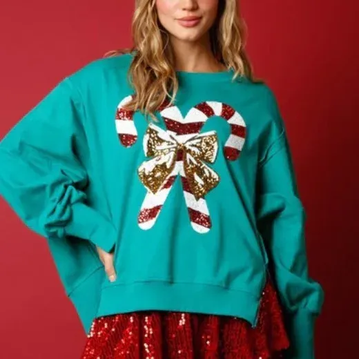 T-shirt 2023 Autunno e Inverno Nuovo stile natalizio con paillettes Candy Cane Hem Fessura Felpa per le donne Streetwear Donna