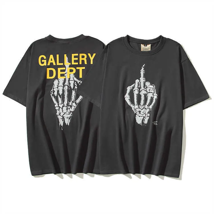 Spring/summer American High Street Gallery Hot Stamped Letter Skull Hand Bone Printed Mens and Womens Leisure Short Sleeved T-shirt Trend