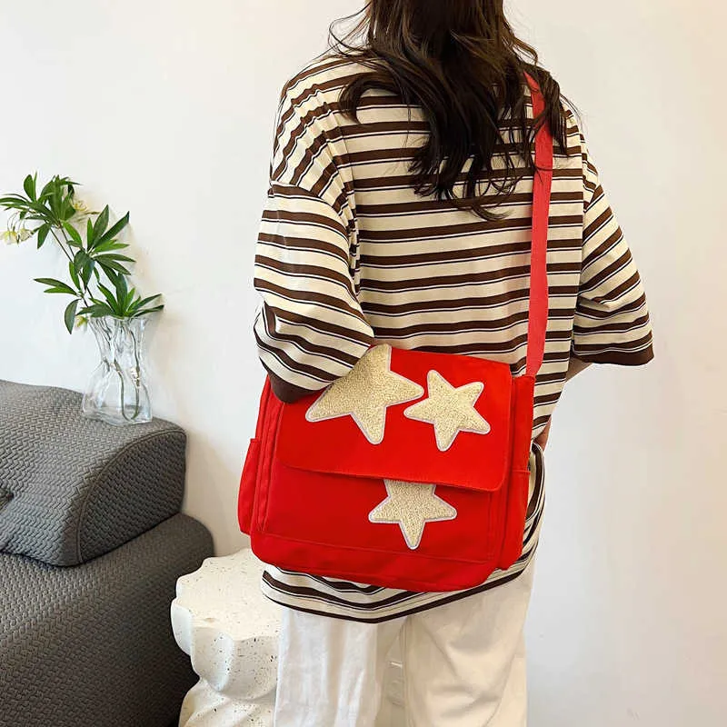 Sacos de compras Multidão Design Sensation Star Mochila para estudantes universitários femininos Bolsa de classe Aulas de maquiagem Grande capacidade Um ombro Crossbody Diferença