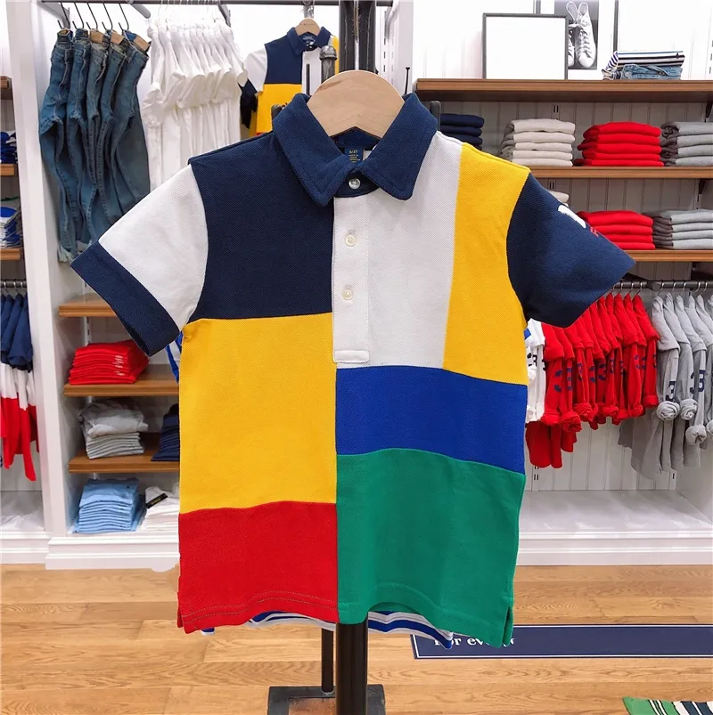 Nueva camisa polo de manga corta Moda europea y americana para hombres Bordado de siete colores empalme 100% algodón Camiseta al por mayor S-6XL