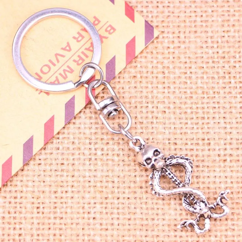 Keychains 20st Fashion Keychain 37 20 mm Skull Skeleton Wand Pendants Diy Men smycken bil Key Chain Ring Holder Souvenir för gåva