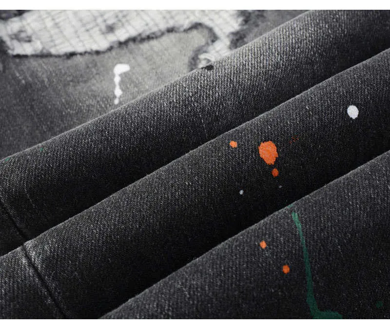 Jeans slim fit da uomo con ricami in nero e grigio_voghion.com