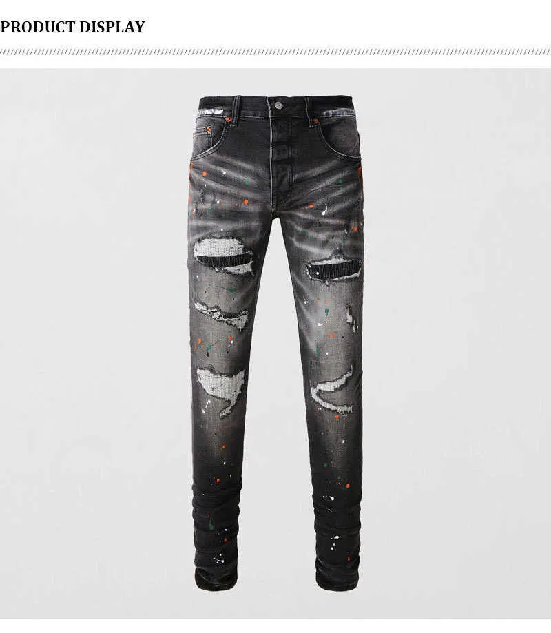 Jeans slim fit da uomo con ricami in nero e grigio_voghion.com