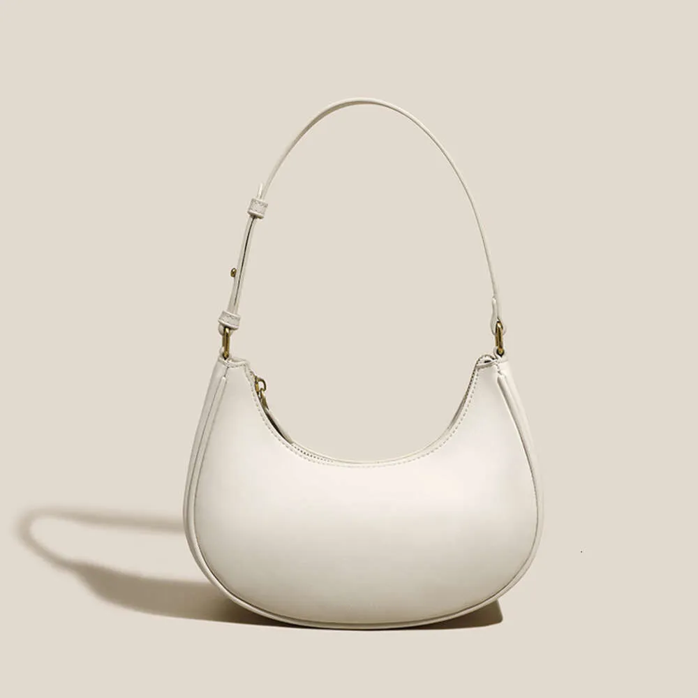 Bolsa de saída da loja nas axilas outono e inverno novo nicho francês luz luxo crescente minimalista vara mão ombro feminino com uma sensação de