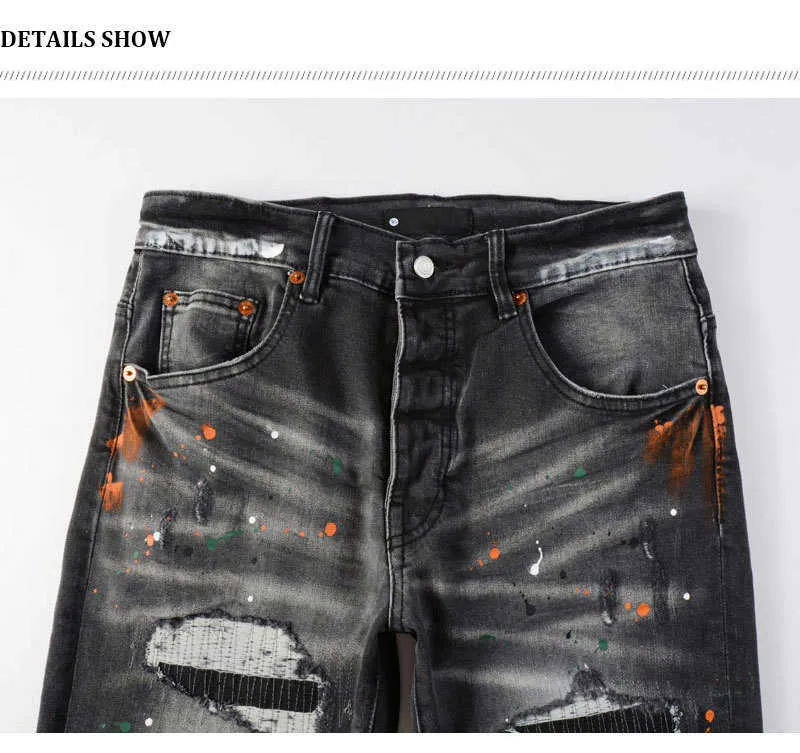 Jeans slim fit da uomo con ricami in nero e grigio_voghion.com