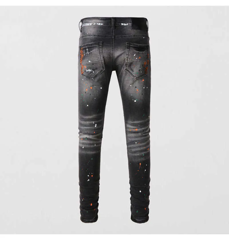 Jeans slim fit da uomo con ricami in nero e grigio_voghion.com