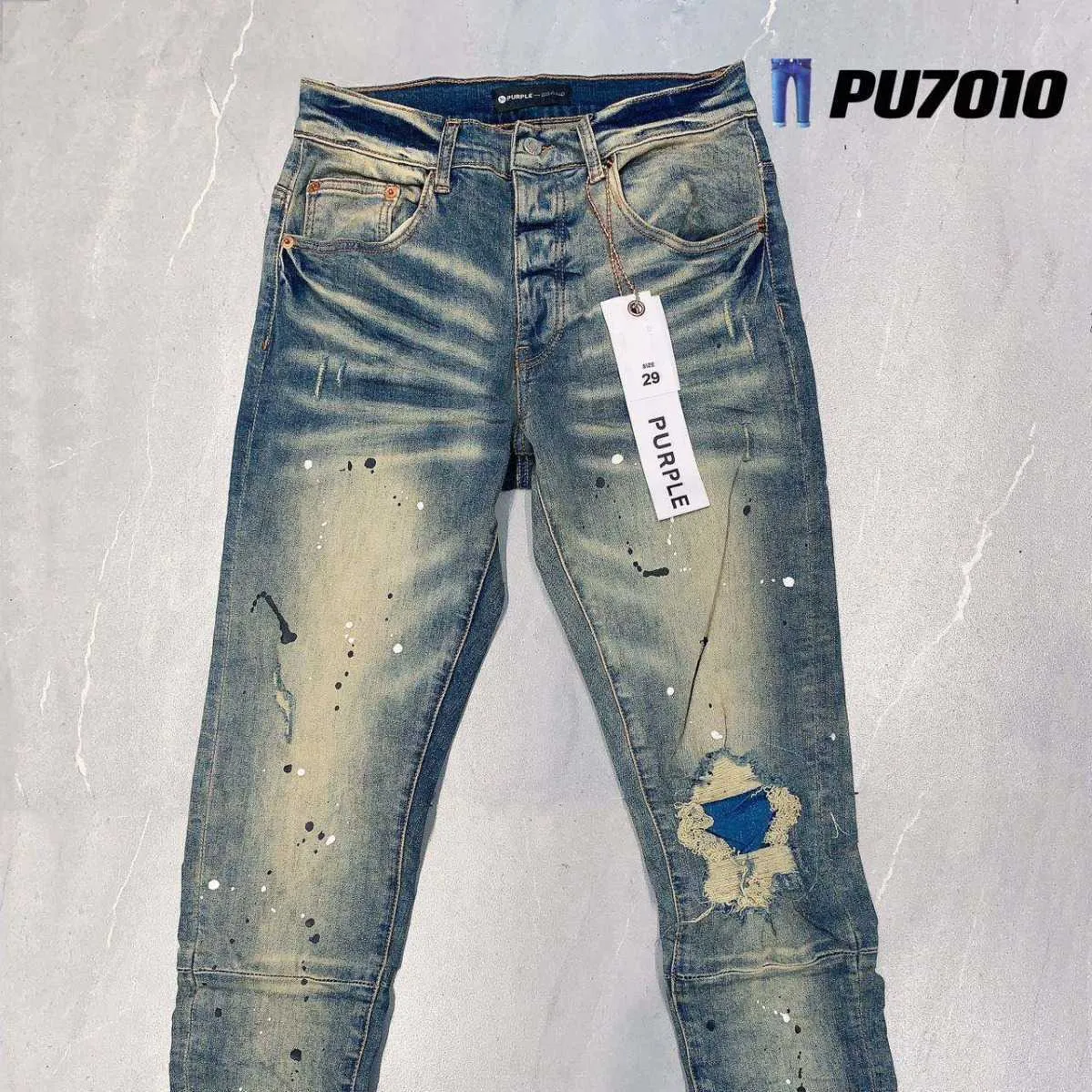 Paarse merkjeans Amerikaanse high street jeans met moddergele wassing