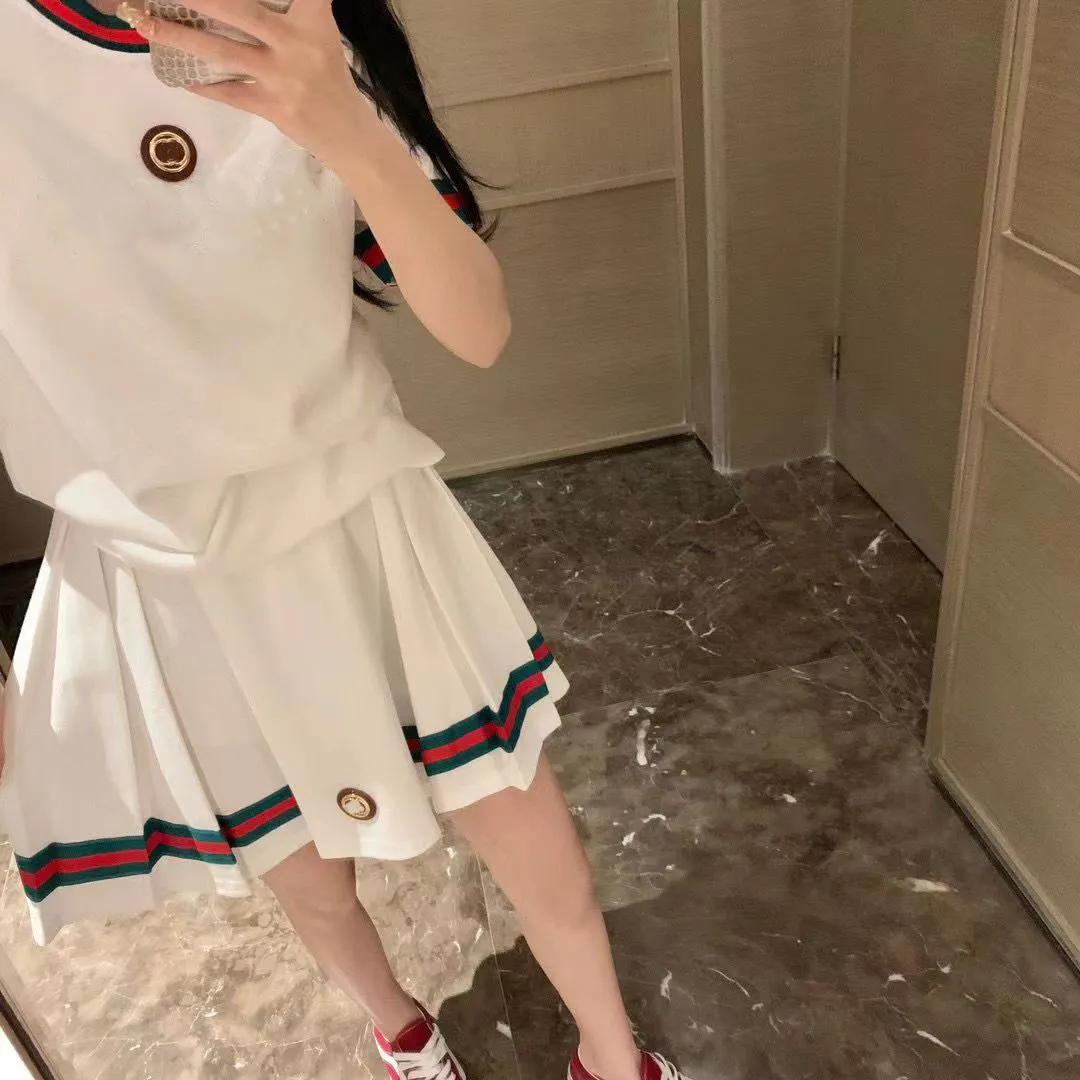 Italian fashion designer classic letters luxury metal label round neck women's T-shirt + Luxury pleated skirt Fashion casual vacation women spring summer set