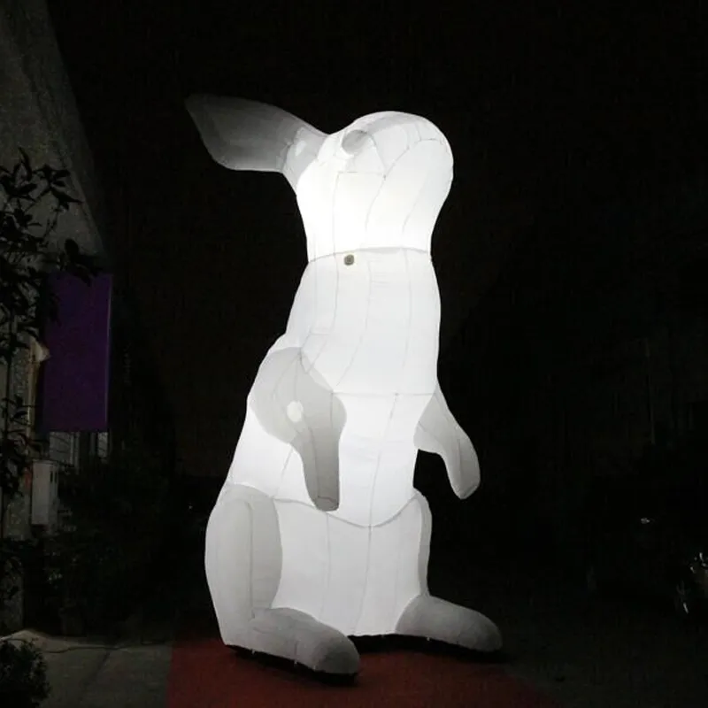 Venta al por mayor publicidad personalizada conejo inflable gigante blanco/dibujos animados de animales/conejito de Pascua inflable con luz LED para la venta