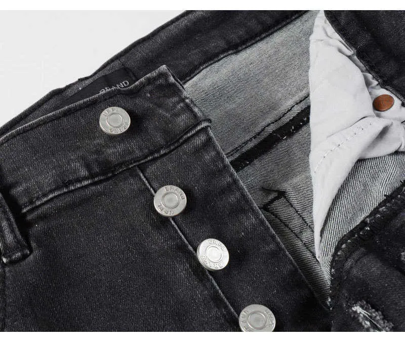 Jeans slim fit da uomo con ricami in nero e grigio_voghion.com
